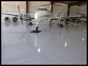 armorpoxy epoxy floor airplane hangar featuring armor ultra epoxy