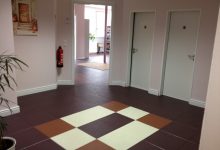 Thumbnail - red, off-white, brown supratile interlocking floor tiles added to school floor